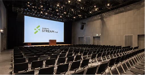 Shibuya Stream Hall with a screen and rows of seats